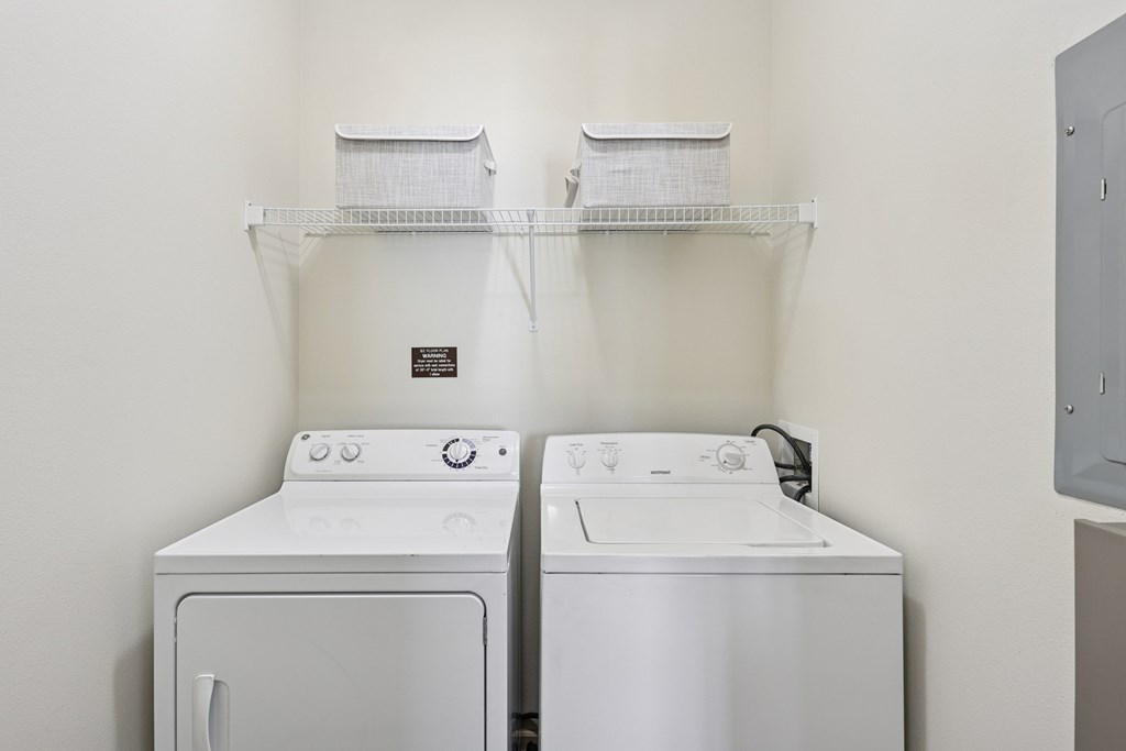 In-unit washer and dryer in a dedicated laundry space at Tattersall Village Apartments in Hinesville