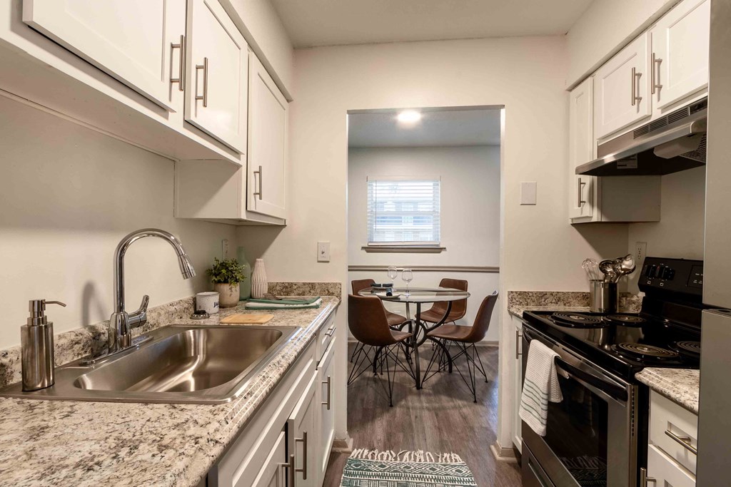 The Jaunt Apartments in Charleston South Carolina photo of kitchen with white cabinets