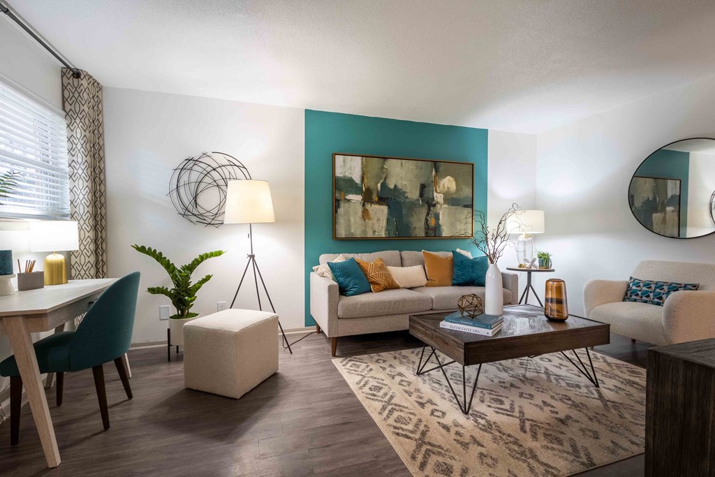 The Jaunt Apartments in Charleston South Carolina photo of  a living room with a couch and a table