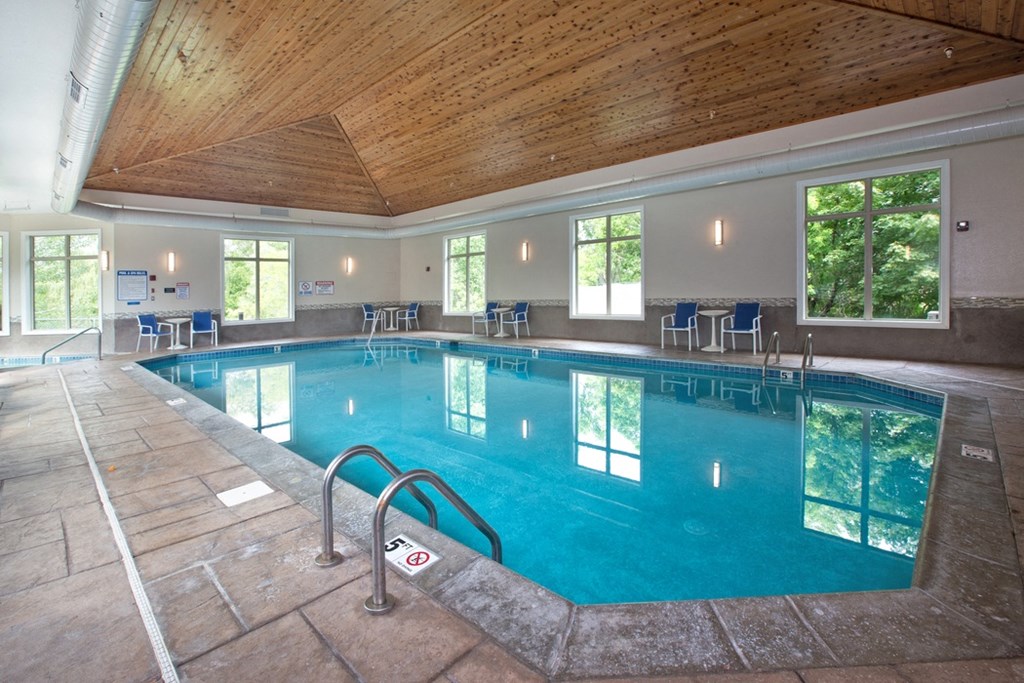 Laurel East End Apartments in Golden Valley, MN photo of a swimming pool in a building with a wood ceiling