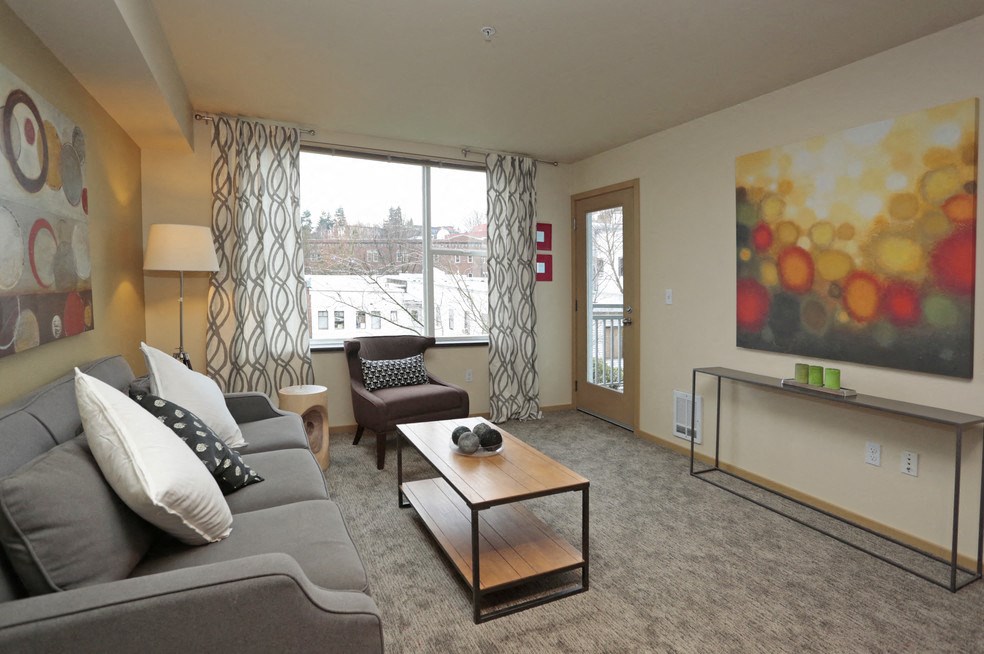 living room with access to private balcony