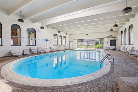Indoor heated swimming pool at Trailgrove Apartments in Southeast Denver offering year-round recreation for residents.