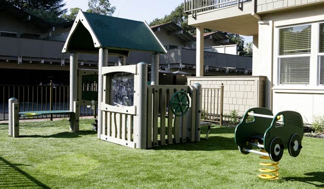 Walnut Creek, CA Apartments Near BART - Westcliffe Trails - Play Area for Children with a Swing, a Seesaw, and Grass