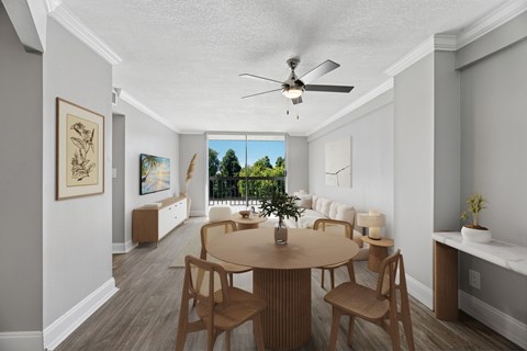 Dining area and open living space inside a renovated apartment at Wilton Tower in Wilton Manors, FL.

15. shooootin-photo-15_final