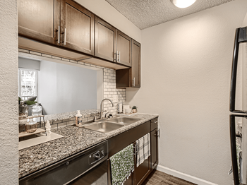 newly renovated kitchen at Denver CO apartments - Photo Gallery 2