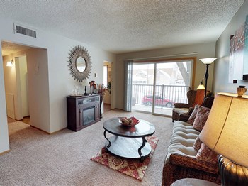 living room at Winchester Apartments in Rochester - Photo Gallery 2
