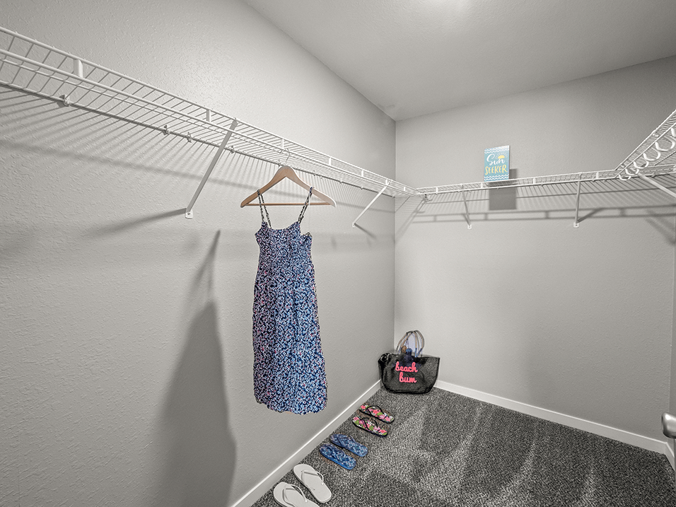 walk-in closet in apartment bedroom in Holly, Michigan