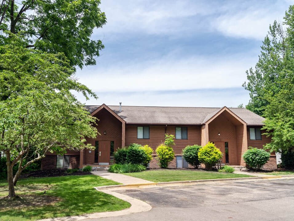 exterior of Old Farm Shores Apartments