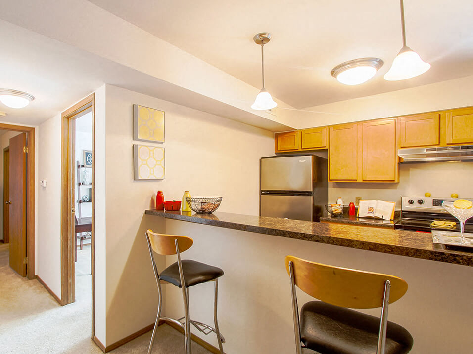 Apartment kitchen with Breakfast Bar