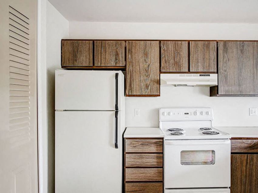 apartment kitchen with appliances in Norton Shores, MI - Photo Gallery 1