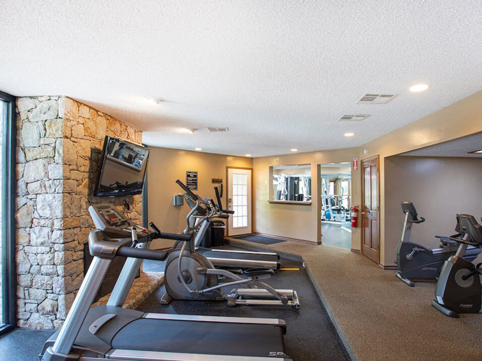 fitness center at apartment complex