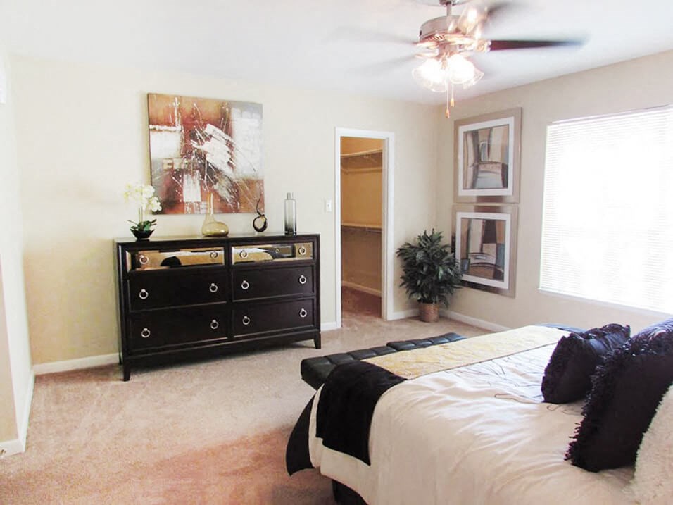 bedroom with walk-in closet