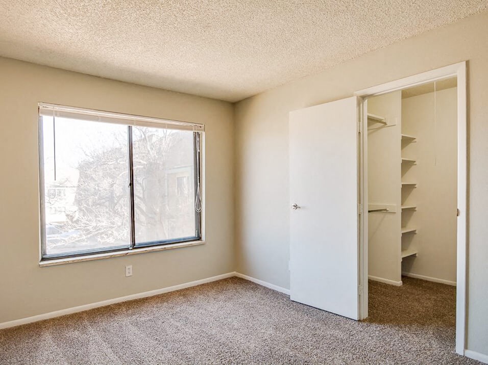 bedroom with closet in Aurora, CO