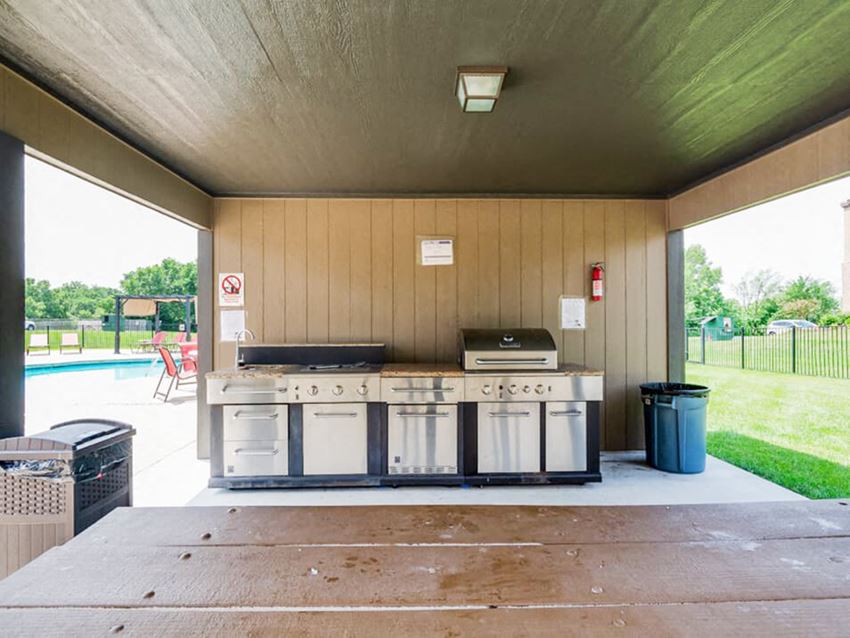 outdoor grill at The Hills apartments - Photo Gallery