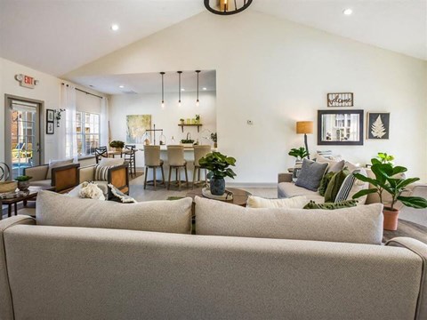 a living room with a couch and a table