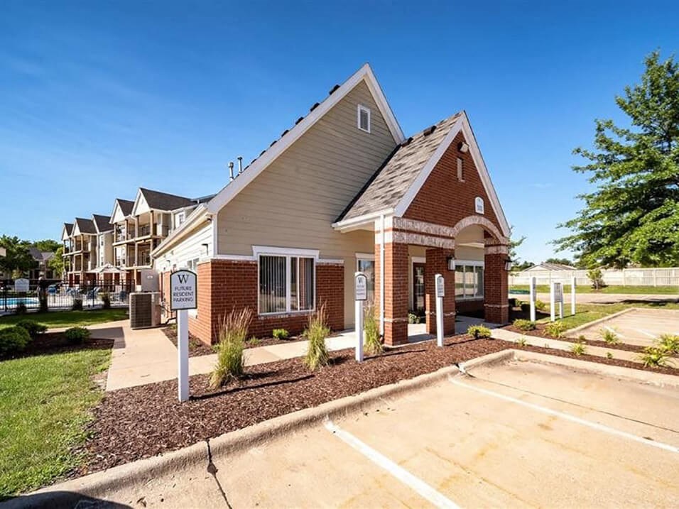 Exterior of Clubhouse at Village Woods apartments