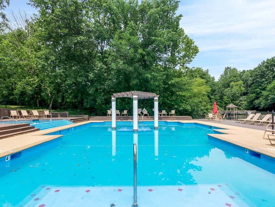 outdoor swimming pool at apartment complex