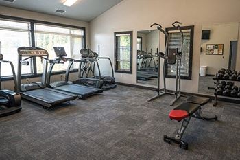 fitness center with cardio equipment at arcadia grove apartments
