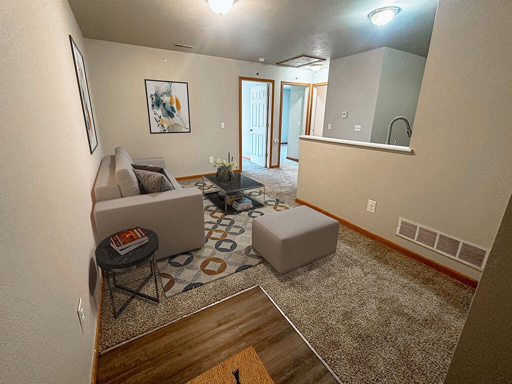 a living room with a couch and a table