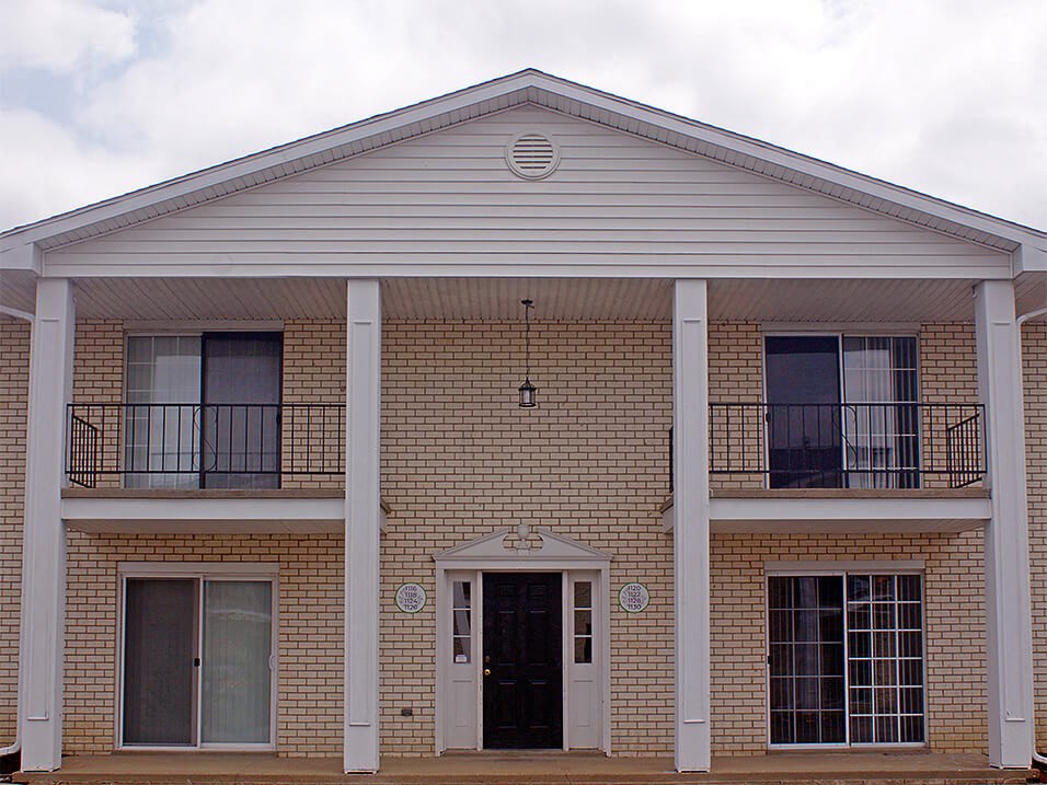 brick apartment building with air conditioning