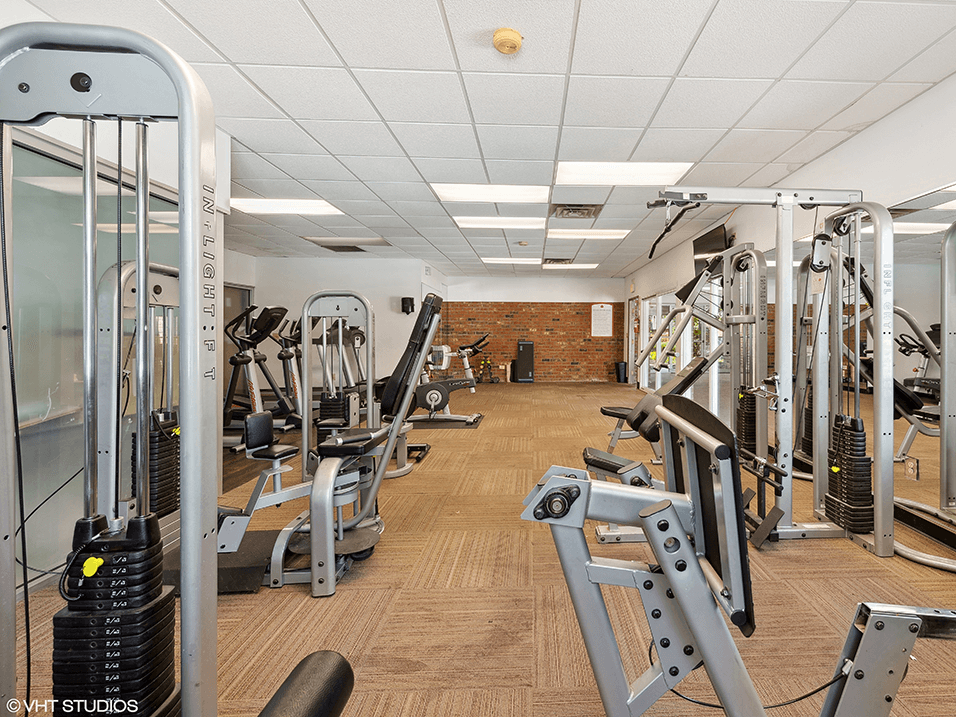 fitness center at apartment community