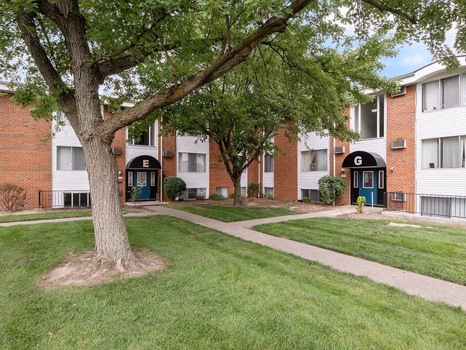 apartment community with mature shade trees