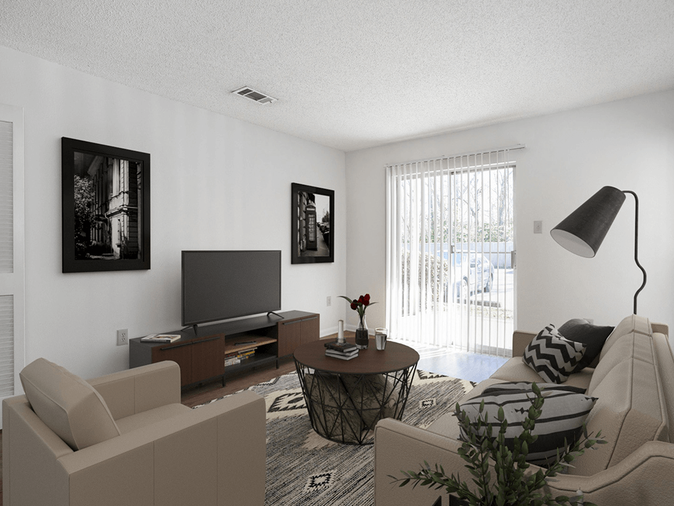 apartment living room with sliding glass door to patio