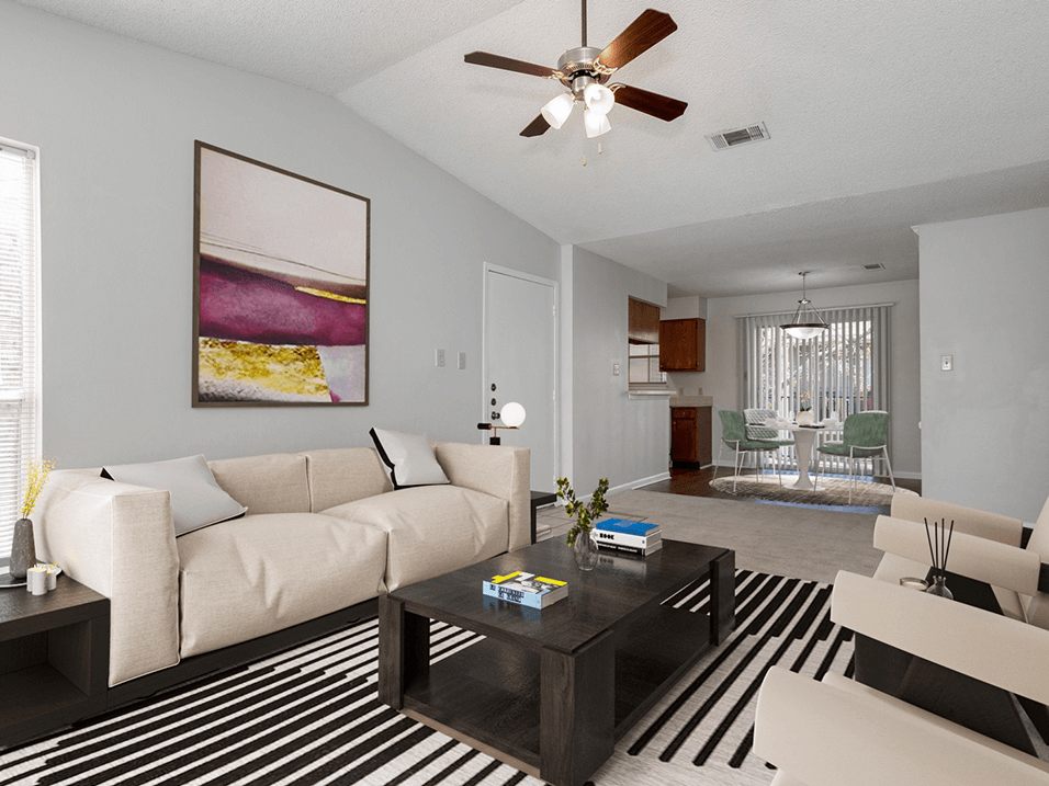 apartment living room with ceiling fan