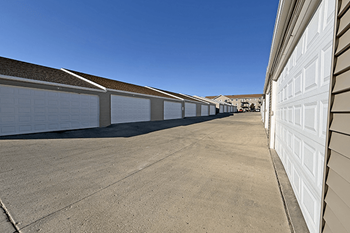 A row of garage doors are closed.