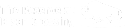 A logo with a bison and the text "The Reserve at Bison Crossing".