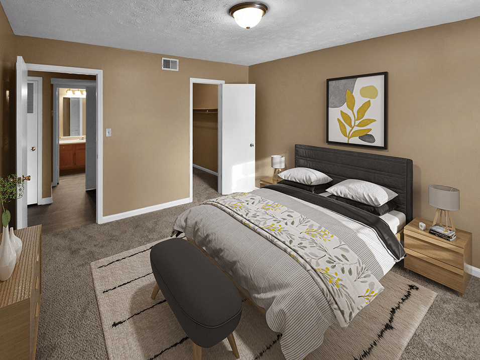 apartment bedroom with a walk in closet