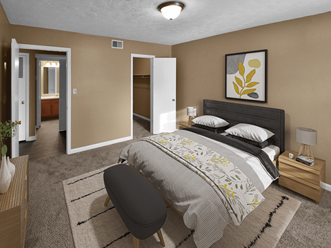 apartment bedroom with a walk in closet