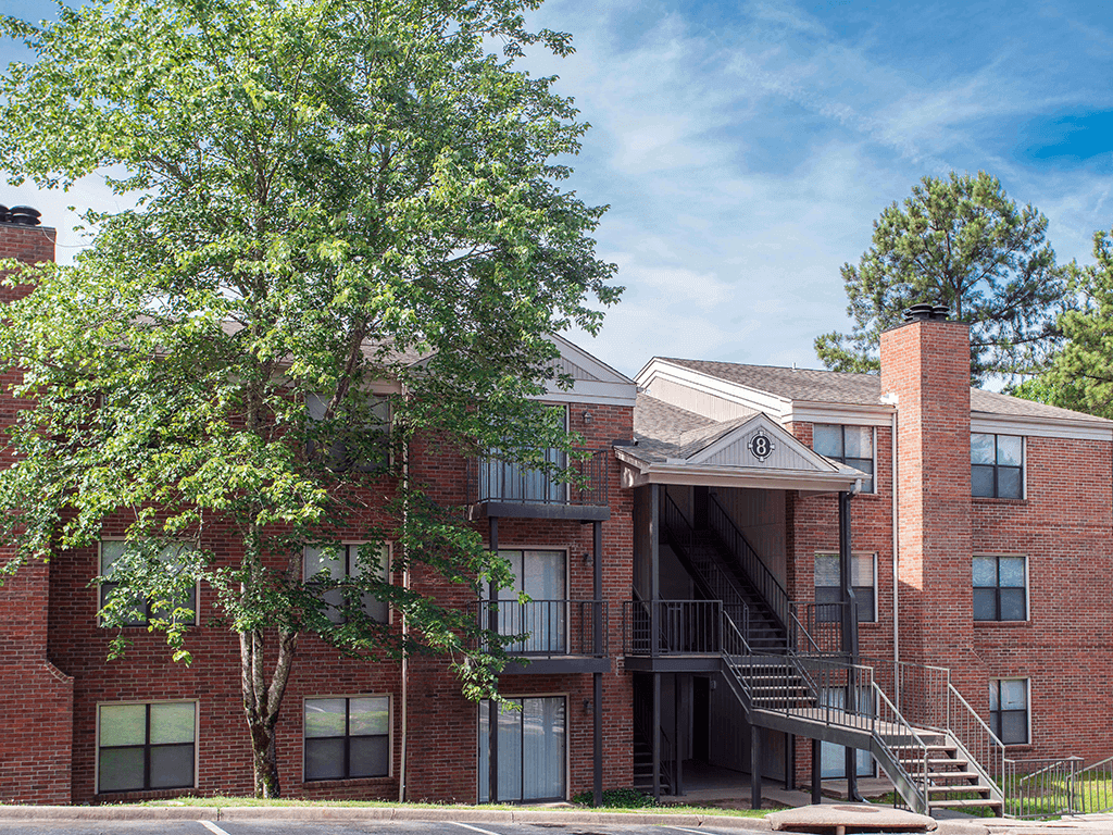 our apartments are located little rock with large trees