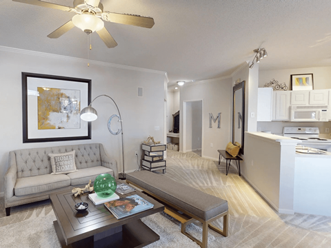 a living room with a couch and a table