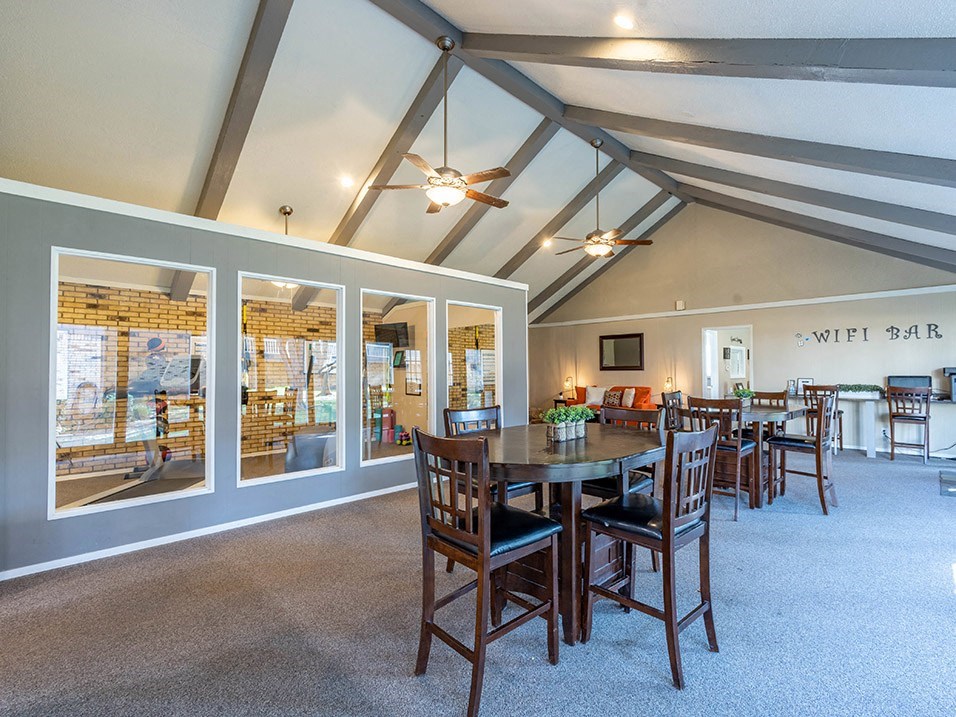 seating area in clubhouse at Camelot apartments