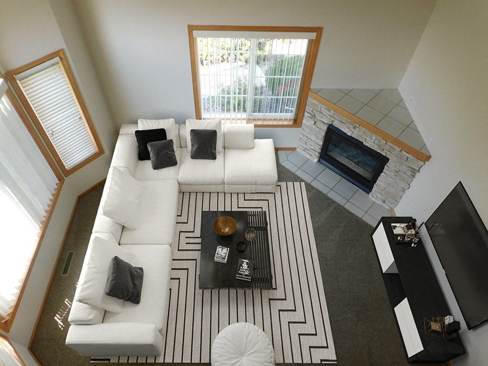 a view of the living room from the loft