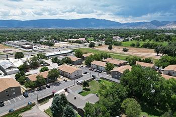 arial view of a city with mountains in the background