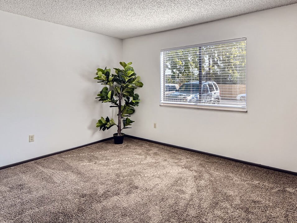 Bedroom with window at country green apartments