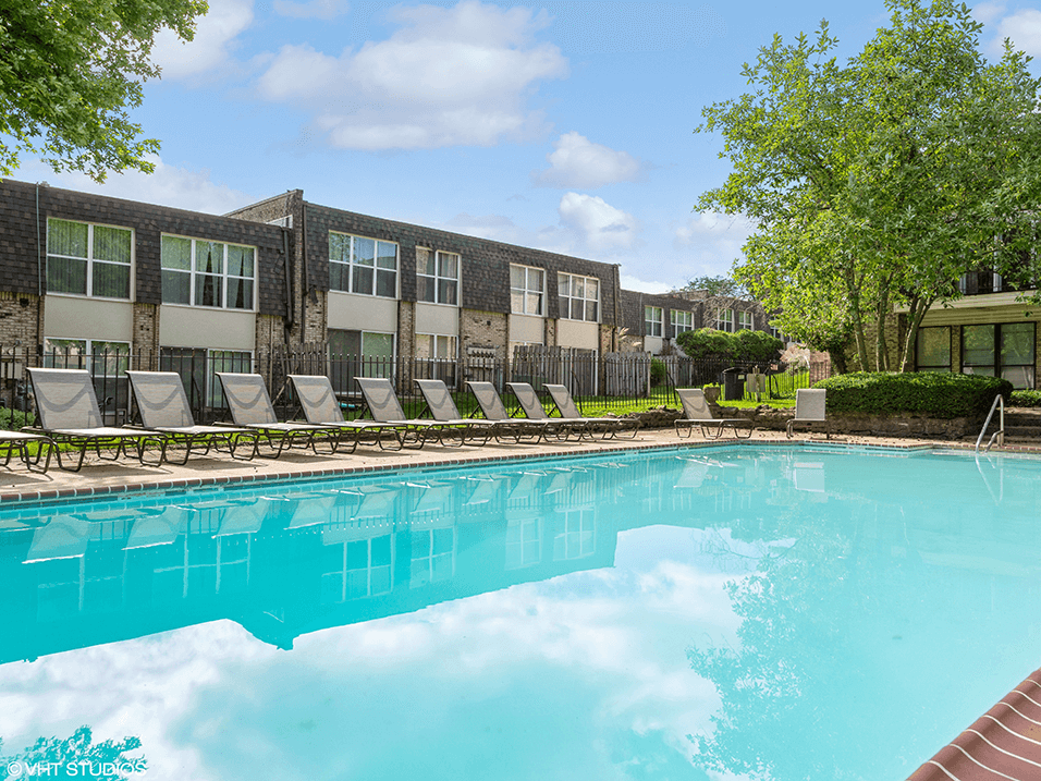 our apartments have a large swimming pool with lounge chairs