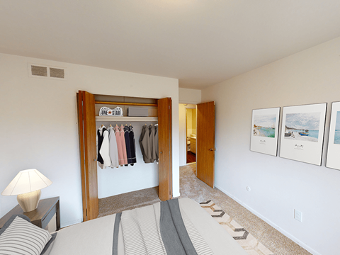 Bedroom of apartment in Southfield, Michigan with large closet.