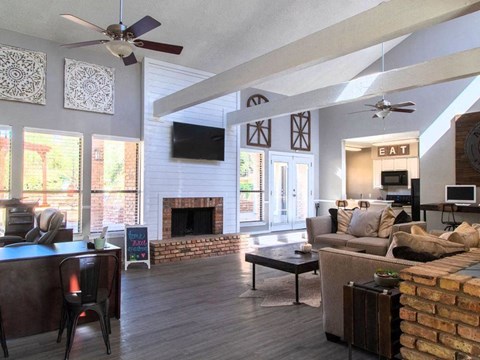 a living room with a couch and a fireplace