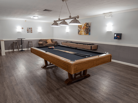 A pool table in the clubhouse