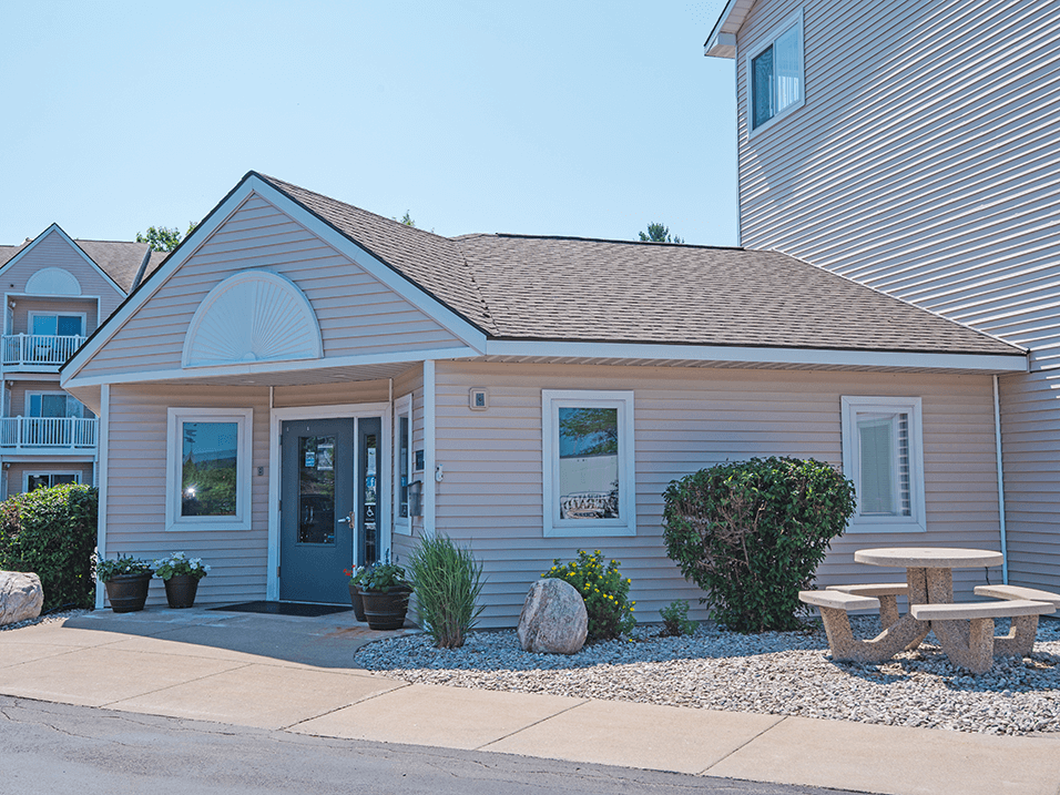 a building with a picnic table in front of it