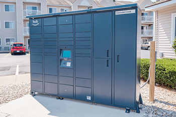 a group of lockers in front of an apartment building