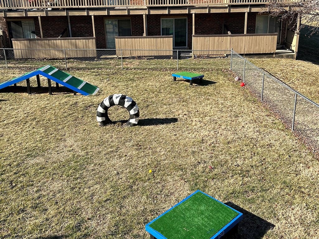 fenced dog park at apartment community