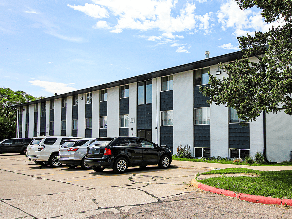 Facade and parking at East Edge Apartments