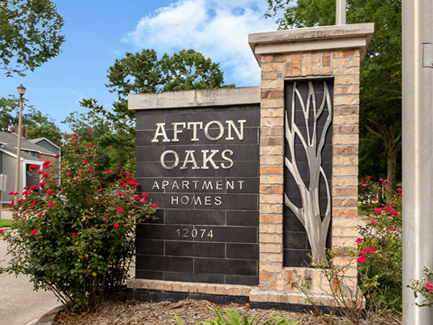 welcome sign at Afton Oaks Apartments