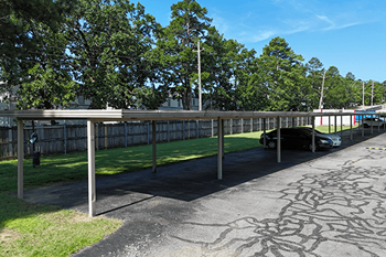 A carport at an apartment complex.