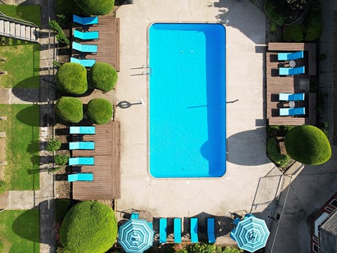 an aerial view of a swimming pool at Fairfield Apartments