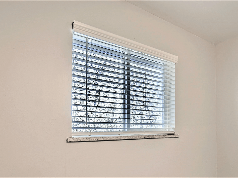 South Federal Apartments Bedroom with Window and cordless blinds in select units